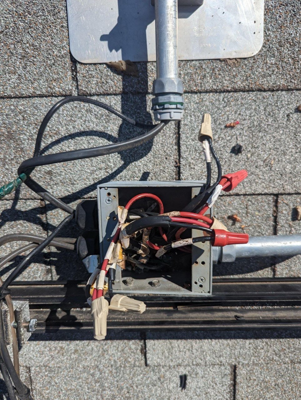 A junction box left improperly wired by a previous installer