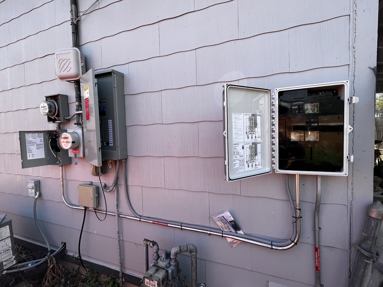 Enphase IQ combiner panels opened for inspection
